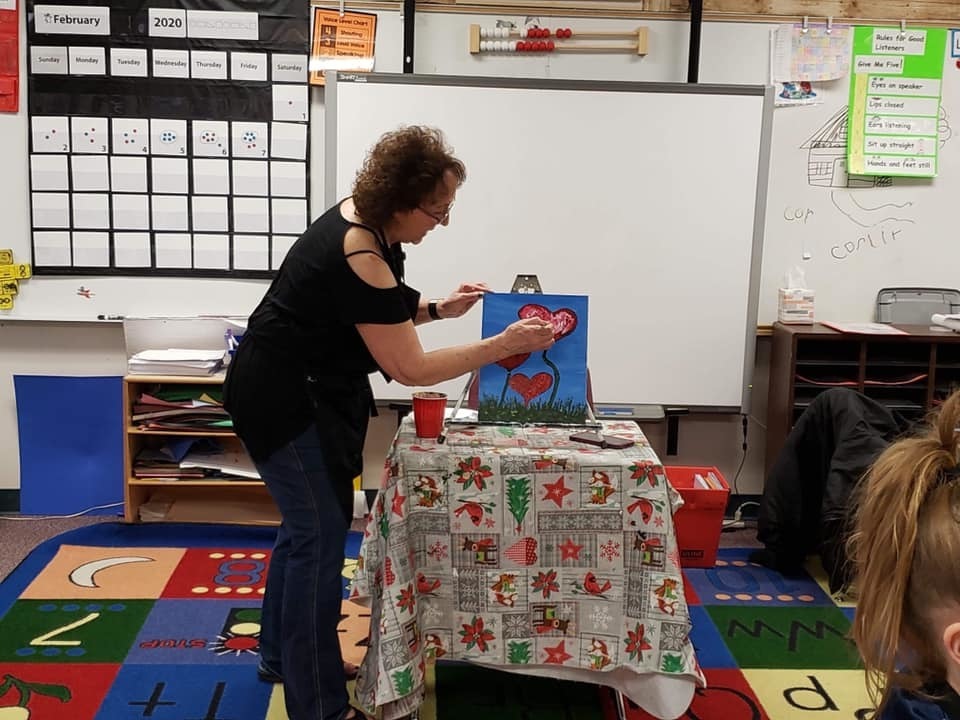 Linda painting with her class